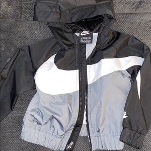 Toddler Nike windbreaker with hood.